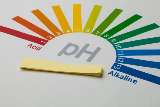 pH test strip showing acidity and alkalinity for cold process soap