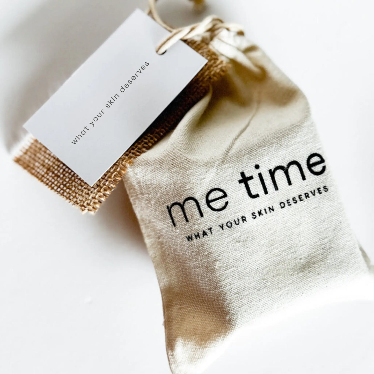 Reusable cotton gift bag holding Daily Care Set