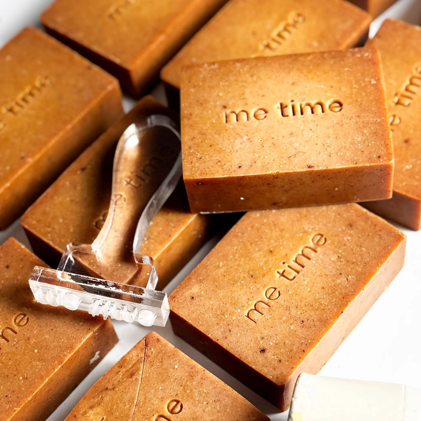 Handcrafted Radiance Turmeric Soap bar made with natural turmeric powder, olive oil, coconut oil, and citrus essential oils. Designed to brighten and nourish skin for a radiant glow.