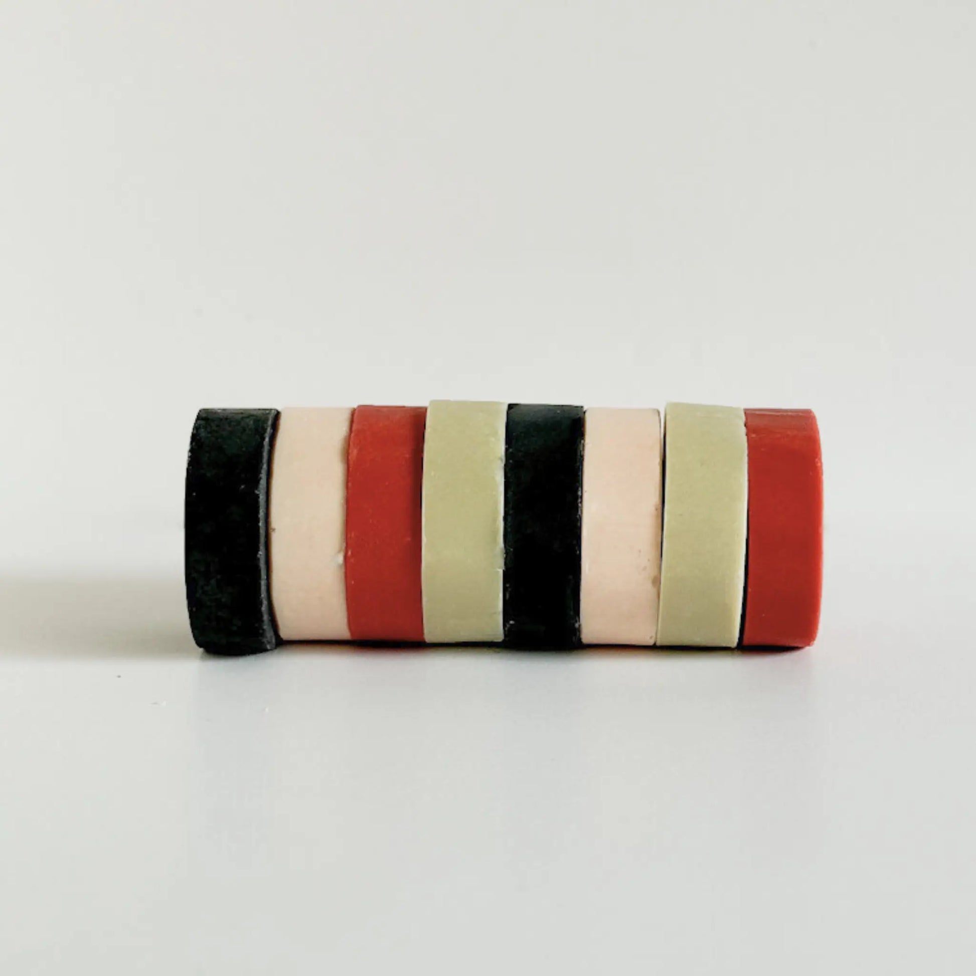 Whispers of the Earth luxury natural soap collection – four round clay and charcoal bars handcrafted by Me Time Soaps for women in the UAE.
