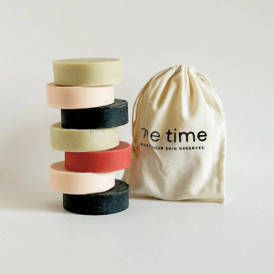 Whispers of the Earth luxury natural soap collection – four round clay and charcoal bars handcrafted by Me Time Soaps for women in the UAE.